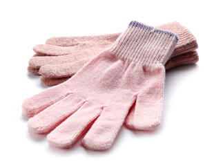 Pink warm gloves isolated on white background, closeup