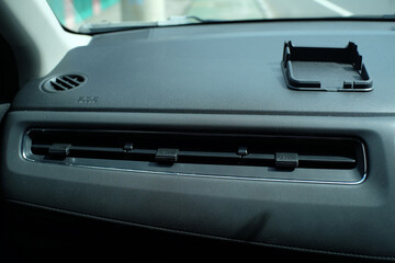 The ventilation of cold or low temperature air in a car air conditioner is located on  dashboard.