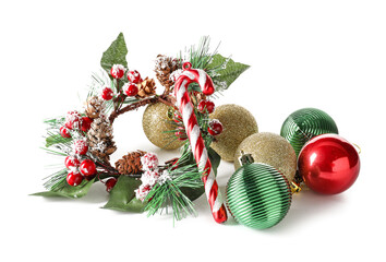 Beautiful Christmas fir branch with balls and decor isolated on white background