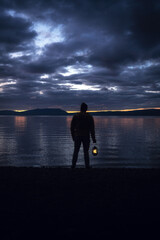 Fototapeta premium person watching sunset