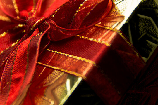 Christmas present gift box with red ribbon