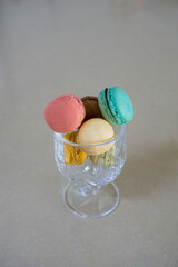 mini macarons in a cup of glass goblet