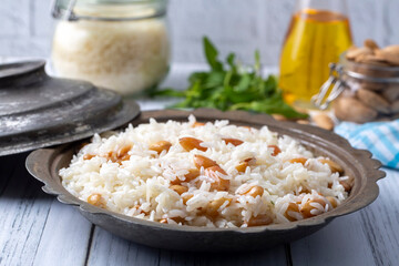 Traditional delicious Turkish food; Almond rice pilaf (Turkish name; Bademli pirinc pilavi)