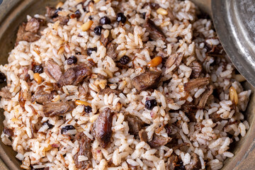 Traditional delicious Turkish food; rice pilaf with pine nuts and currants (Turkish name; ic pilav or pilaf)