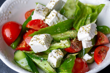Sliced cucumber tomatoes, peppers and cheese (Turkish name; sogus) Greek salad.