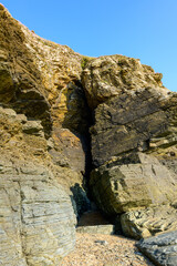 A cave in Cap de Carteret in Europe, France, Normandy, Manche, in spring, on a sunny day.