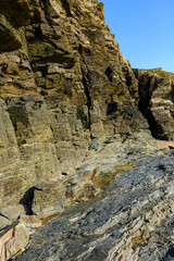 The steep and rocky cliffs of Cap de Carteret in Europe, France, Normandy, Manche, in spring on a sunny day.