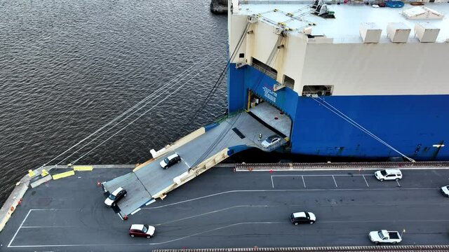 Overhead Aerial View of Vehicles Being Loaded and Unloaded from a Vehicle Carrier Ship Delaware River Philadelphia