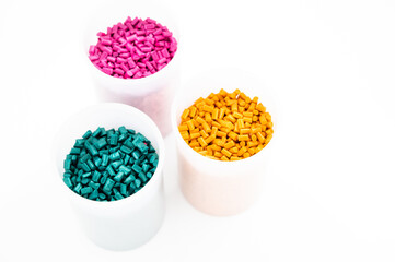 Plastic granules close up for holding,Colorful Plastic granules with white background.