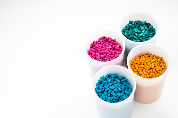 Plastic granules close up for holding,Colorful Plastic granules with white background.