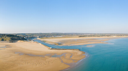 The exit from the port of Plage de la Potiniere in Europe, France, Normandy, Manche, in spring, on a sunny day.