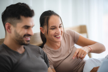 Obraz premium man and woman couple person are working together with laptop from home