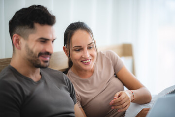 Fototapeta premium man and woman couple person are working together with laptop from home