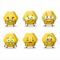 yellow gummy candy D cartoon character with sad expression