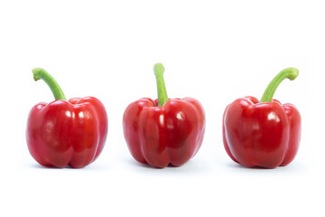 Set of bell pepers is red on white background. Organic vegetables.