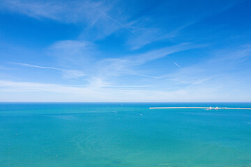 The Channel Sea and its turquoise colors in Europe, France, Normandy, towards Etretat, in summer, on a sunny day.