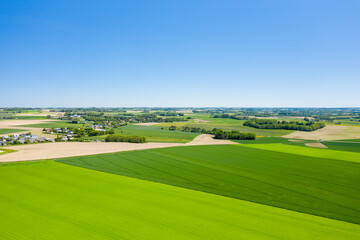 The Normandy countryside and its green colors in Europe, France, Normandy, towards Deauville, in summer, on a sunny day.
