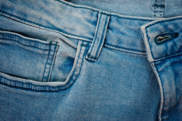 Fototapeta premium Textured blue denim texture stitched with a button-up texture.