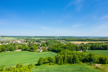 Fototapeta na wymiar The groves around the town of Ranville in Europe, France, Normandy, towards Caen, Ranville, in summer on a sunny day.