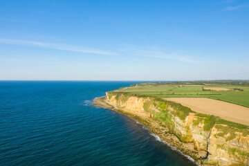 The Norman Cliffs at sunset in Europe, France, Normandy, towards Deauville, in summer, on a sunny day.