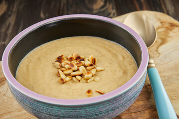 Creamy pear and chestnut soup with paprika. French gourmet cuisine