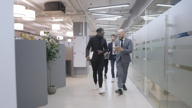 business meeting. Discussion of the start-up of the project. Young multiracial programming team