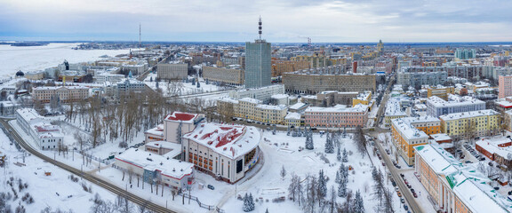 Panoramic aerial view of Arkhangelsk and Lomonosov Drama Theatre on cloudy winter day. Arkhangelsk Oblast, Russia.