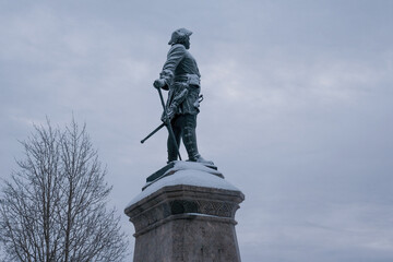 View of Peter The Great monument on cloudy winter day. Arkhangelsk, Russia.