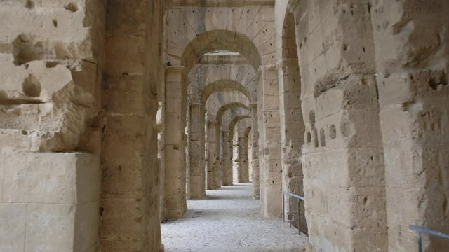Walking Through Passage Of Ancient Amphitheater In El Jem, Tunisia. Tracking