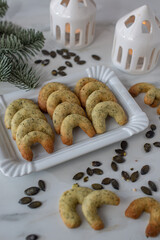 home made german crescent christmas cookies with pumpkin seeds