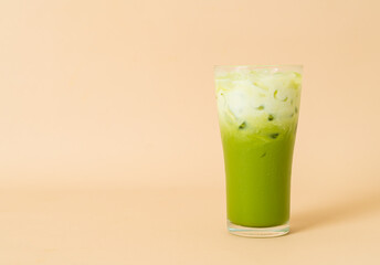 iced matcha green tea latte in glass