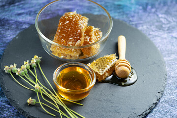 Sweet Honeycomb in wooden plate on wooden background, Natural honey with honeycomb