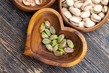 Fototapeta na wymiar fried salted pistachio nuts , close up