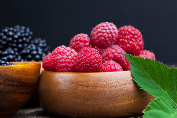 harvested red raspberries, close up