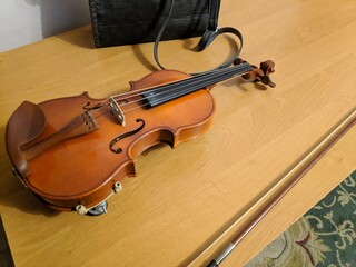 stringed musical instruments. violin and bow. playing the violin. music. retro vintage violin