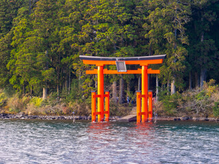 Torii gate at lakeside (Lake Ashinoko, Hakone shrine, Kanagawa, Japan)