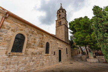 Fototapeta na wymiar A view of the Franciscan monastery bell tower in Cavtat, Croatia.