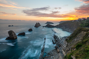 Fototapeta na wymiar Incredible cliffs on the Spanish coast near Santander