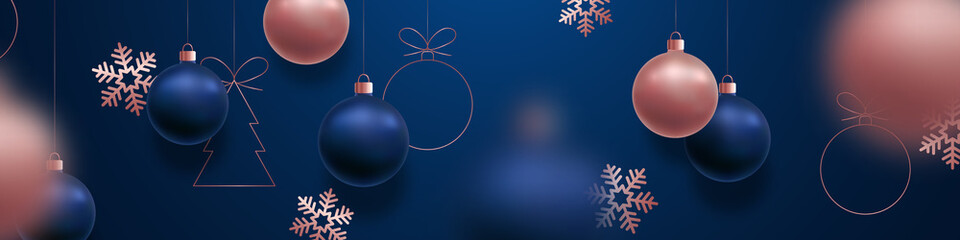 Fototapeta na wymiar Festive Christmas banner. Advertising horizontal banner. Christmas balls motion blur effect. New Year template for web site, store promotion, social media.