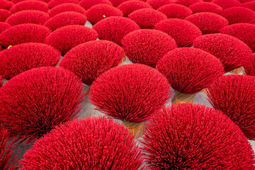 Bamboo sticks being dried outdoor to be made into incense sticks in Quang Phu Cau Village, the outskirts of Hanoi, Vietnam