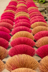 Bamboo sticks being dried outdoor to be made into incense sticks in Quang Phu Cau Village, the outskirts of Hanoi, Vietnam