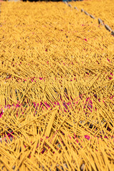 Incense sticks being dried outdoor in Quang Phu Cau Village, the outskirts of Hanoi, Vietnam