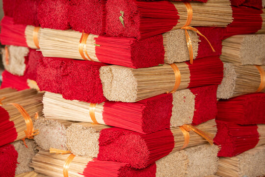 Piles of bamboo sticks to be made into incense sticks in Quang Phu Cau Village, the outskirts of Hanoi, Vietnam