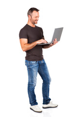 Full lenght of a man using his digital touchpad, isolated on white.