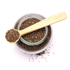 glass can full of organic natural chia seeds close-up isolated on white background