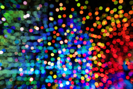 Holidays background. Beautiful holiday city lights bokeh or blur abstract. Colorful holiday lights. Soft focus.