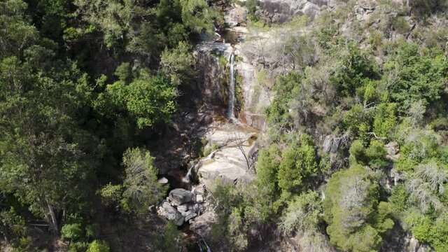 People enjoying the natural pools at Fecha de Barjas waterfall, Peneda-Ger&ecirc;s National Park.