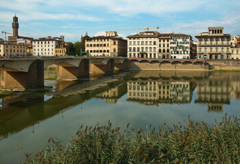 View of the bridge Ponte alle Grazie over the river Arno in Florence, Italy, Europe
