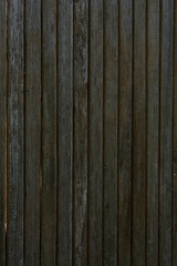 Fototapeta premium old wooden fence from old boards. close-up, can be used as photo background