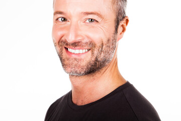 Portrait of a confident smiling man on white background.